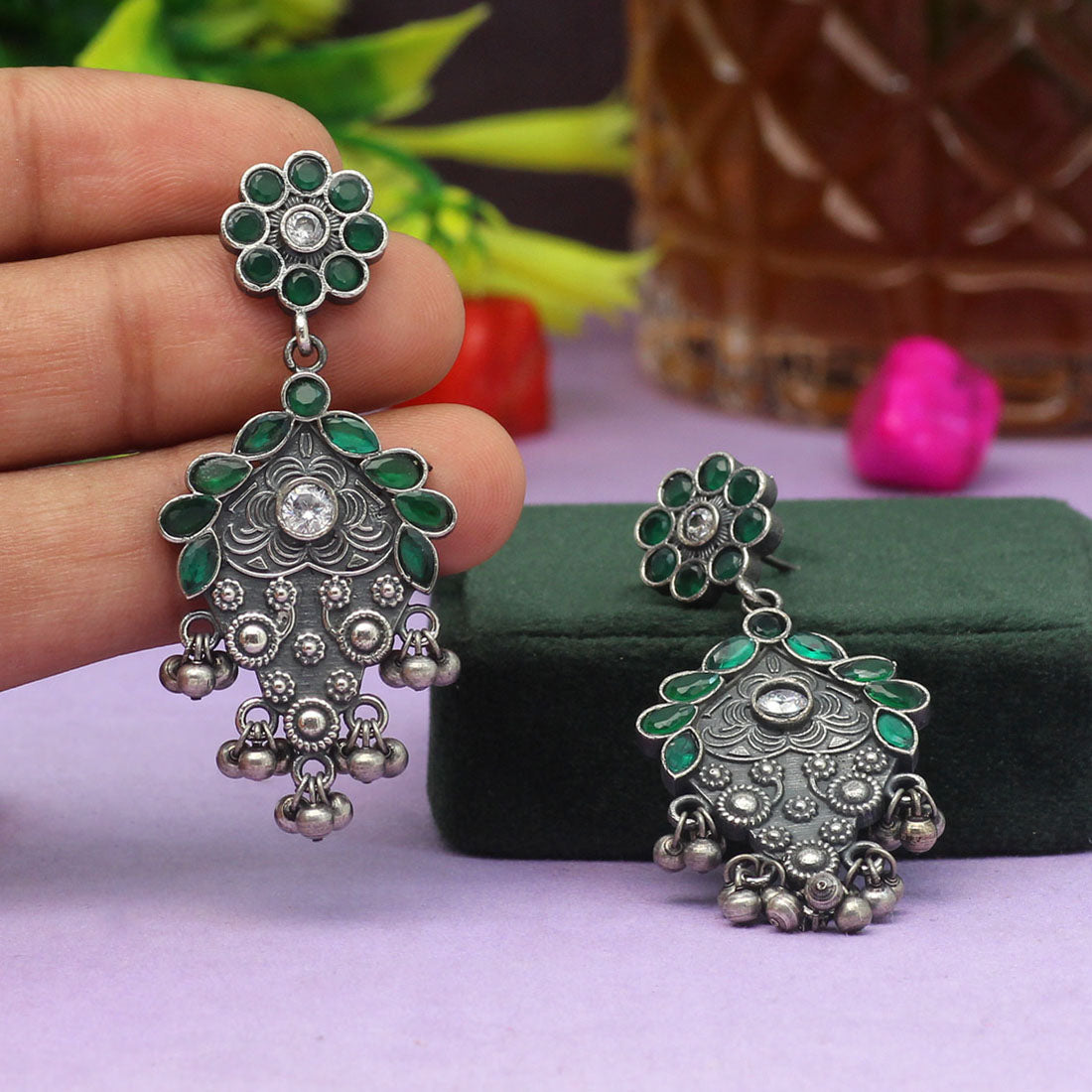 Green oxidised store earrings